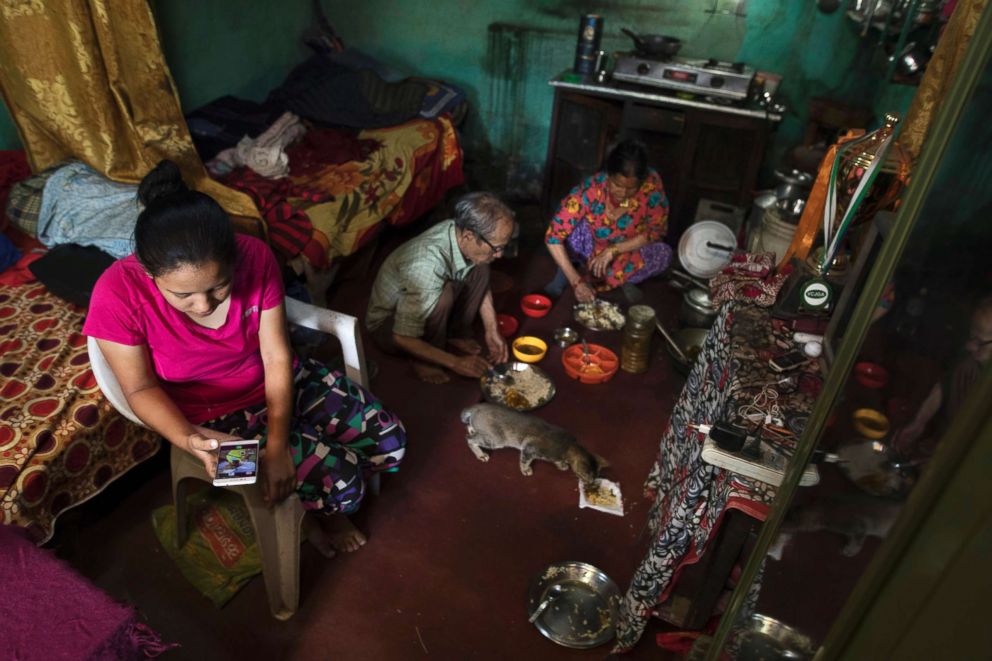 PHOTO: Pratima and her parents reside in a maintenance shed on the Royal Nepal Golf Club.