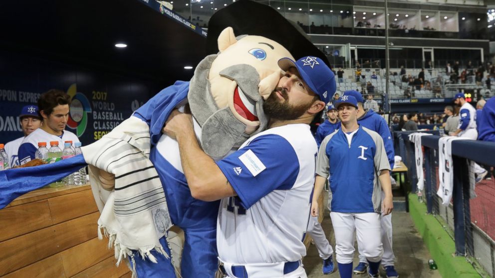 PHOTO: Infielder Cody Decker of Israel holds team mascot The Mensch after game Five between Netherlands and Israel at Gocheok Sky Dome on March 9, 2017 in Seoul, South Korea.