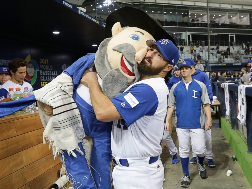 PHOTO: Infielder Cody Decker of Israel holds team mascot The Mensch after game Five between Netherlands and Israel at Gocheok Sky Dome on March 9, 2017 in Seoul, South Korea.