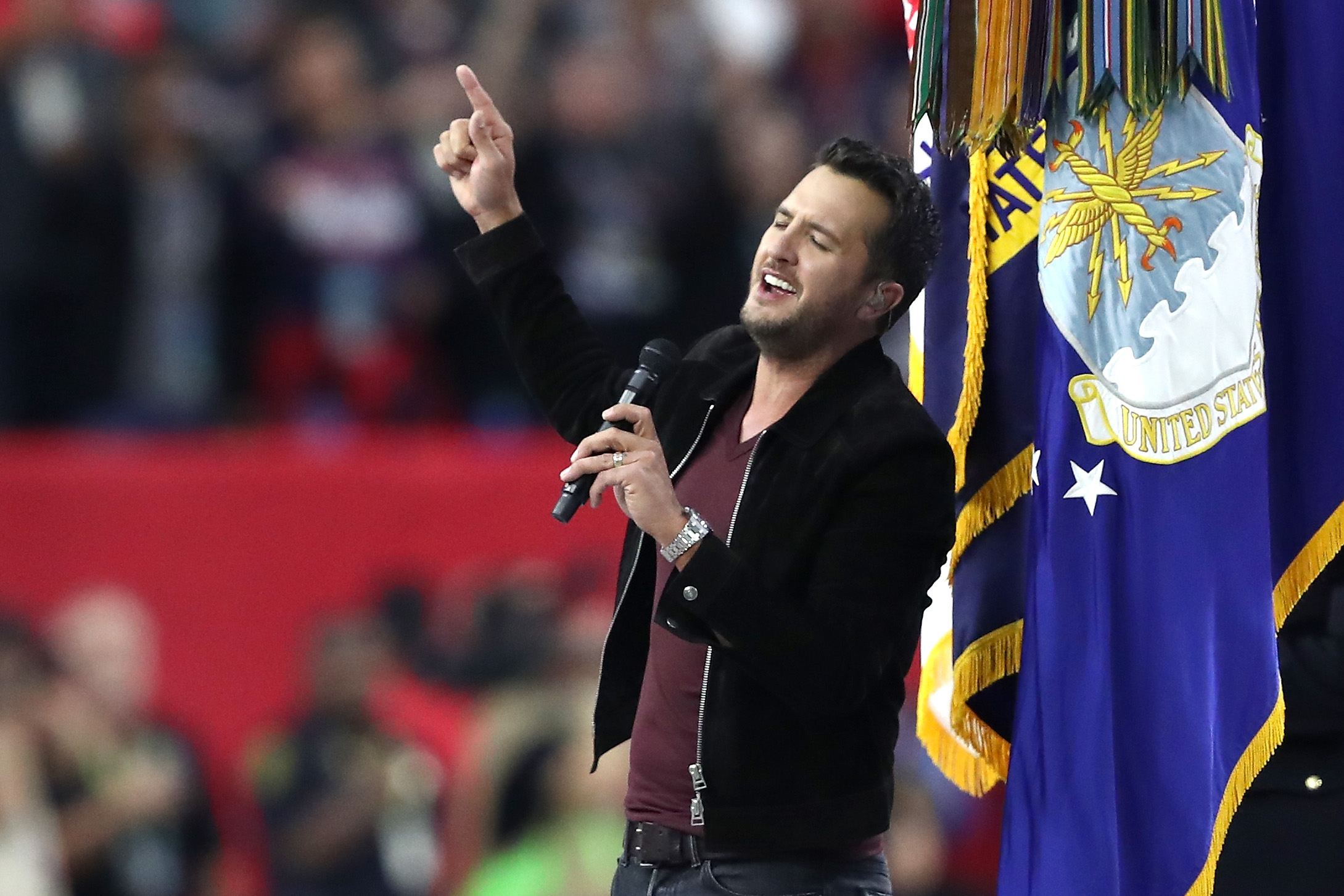 PHOTO: Luke Bryan sings the National Anthem prior to Super Bowl 51 between the New England Patriots and the Atlanta Falcons at NRG Stadium on Feb. 5, 2017 in Houston, Texas.