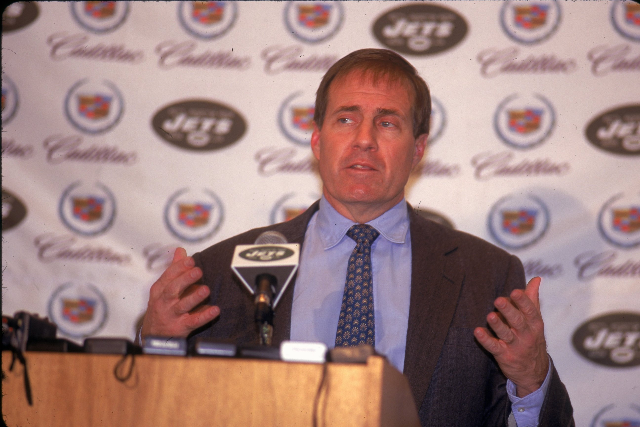 PHOTO: Head coach Bill Belichick of the New York Jets resigns from the job at a press conference just one day after accepting the position at Hempstead, New York on  Jan. 4, 2000. 
