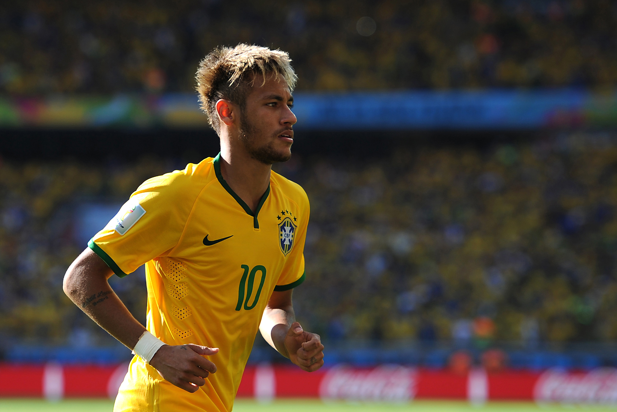 PHOTO: Neymar of Brazil looks on during the 2014 FIFA World Cup Brazil match between Brazil and Chile at Estadio Mineirao on June 28, 2014 in Belo Horizonte, Brazil.