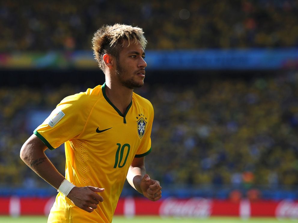 PHOTO: Neymar of Brazil looks on during the 2014 FIFA World Cup Brazil match between Brazil and Chile at Estadio Mineirao on June 28, 2014 in Belo Horizonte, Brazil.