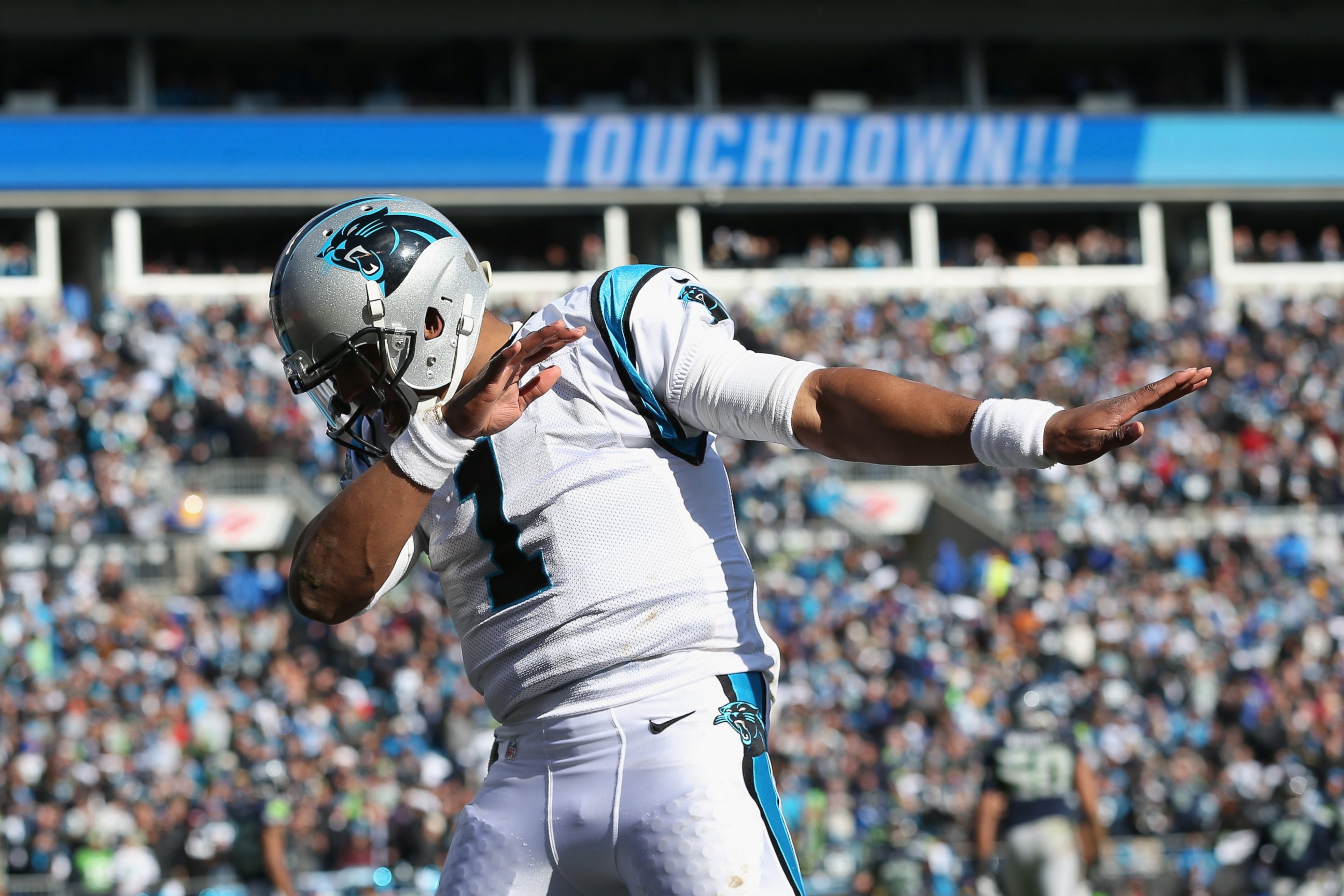 PHOTO: Cam Newton of the Carolina Panthers celebrates after a touchdown during the second quarter of the NFC Divisional Playoff Game against the Seattle Seahawks at Bank of America Stadium on Jan. 17, 2016 in Charlotte, N.C.