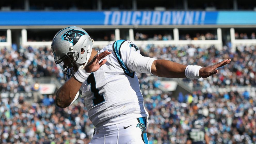 PHOTO: Cam Newton of the Carolina Panthers celebrates after a touchdown during the second quarter of the NFC Divisional Playoff Game against the Seattle Seahawks at Bank of America Stadium on Jan. 17, 2016 in Charlotte, N.C.
