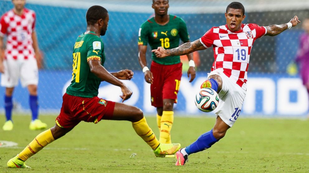PHOTO: Sammir of Croatia controls the ball against Aurelien Chedjou of Cameroon during the 2014 FIFA World Cup Brazil Group A match between Cameroon and Croatia at Arena Amazonia on June 18, 2014 in Manaus, Brazil. 