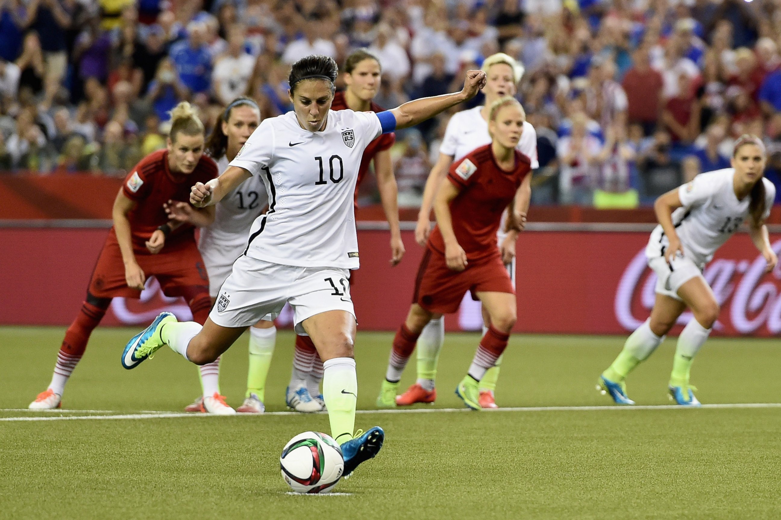 PHOTO: Carli Lloyd of U.S. scores the opening goal from a penalty in the FIFA Women's World Cup 2015 Semifinal Match at Olympic Stadium, June 30, 2015, in Montreal, Canada.