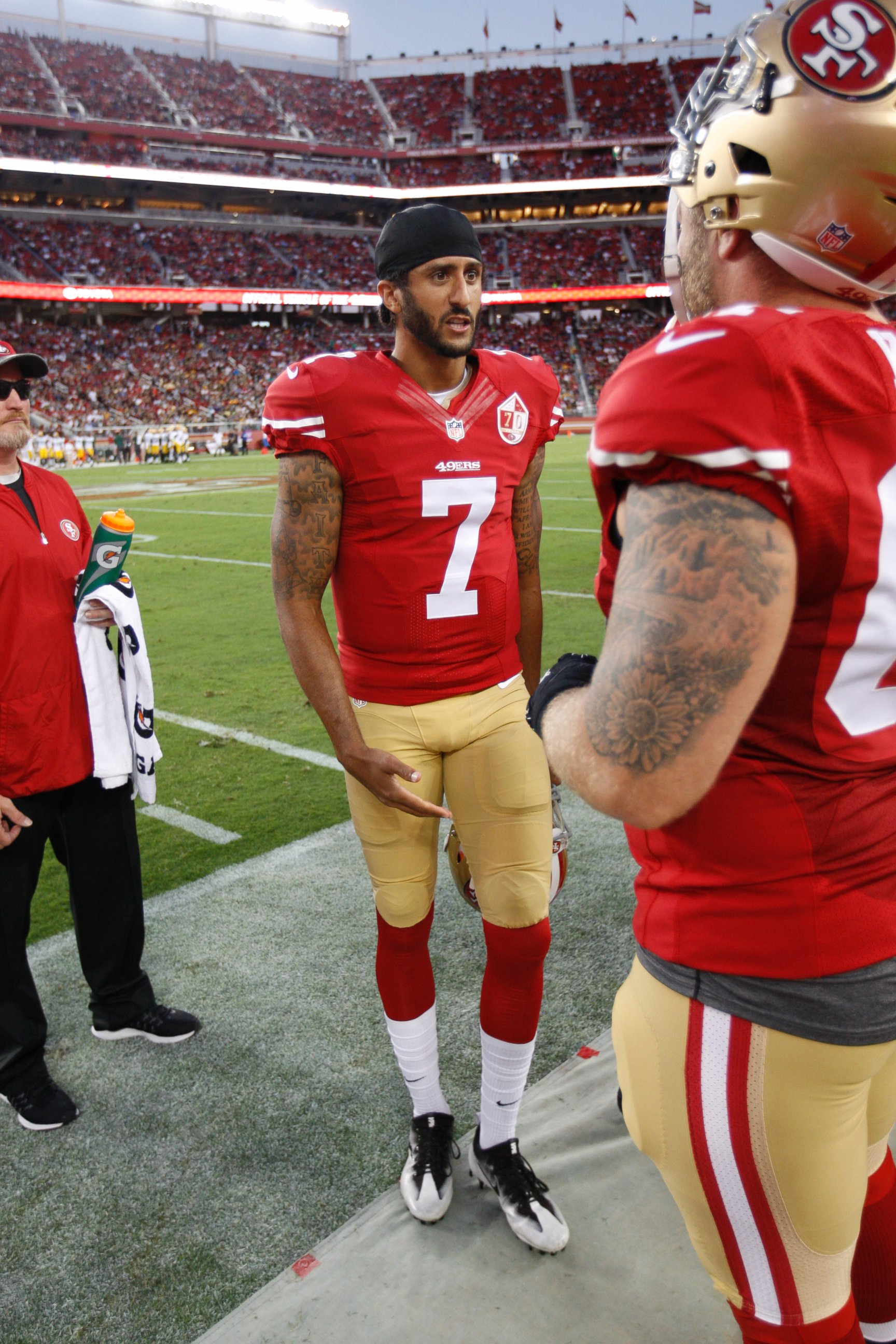 PHOTO: Colin Kaepernick of the San Francisco 49ers stands on the sideline prior to the game against the Green Bay Packers at Levi Stadium on Aug. 26, 2016 in Santa Clara, California.