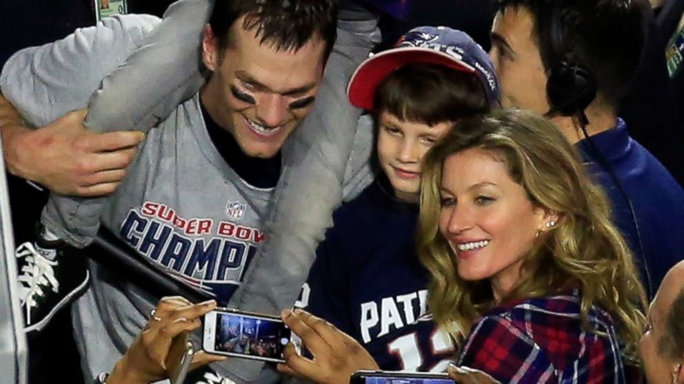 Tom Brady #12 of the New England Patriots celebrates defeating the Seattle Seahawks with his wife Gisele Bundchen and son Benjamin during Super Bowl XLIX at University of Phoenix Stadium on Feb. 1, 2015, in Glendale, Ariz. The Patriots defeated the Seahawks 28-24.