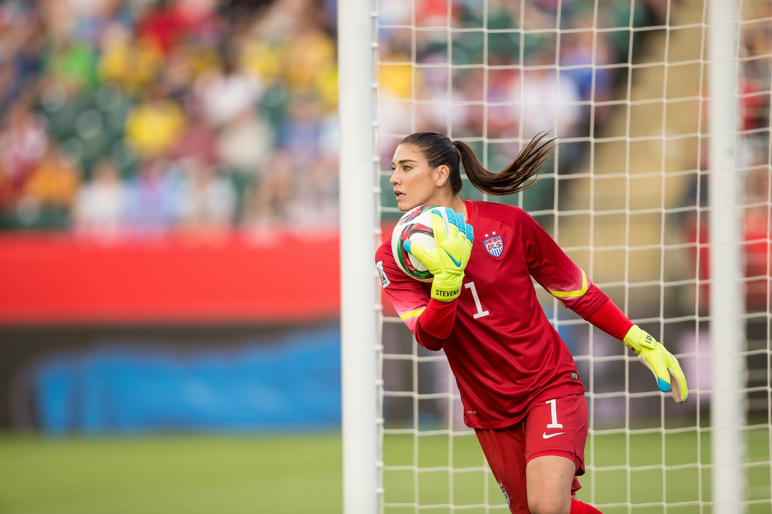 PHOTO: USA goalkeeper Hope Solo makes a save during the United States' 2-0 win over Colombia in their FIFA Women's World Cup Group of 16 Match at Commonwealth Stadium in Edmonton, Canada on June 22, 2015.