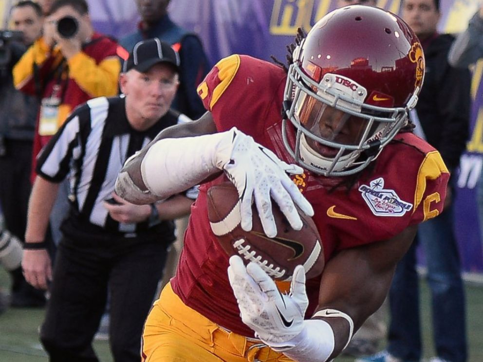 PHOTO: Josh Shaw of the USC Trojans intercepts a pass in the end zone that was intended for Davante Adams of the Fresno State Bulldogs during the Royal Purple Las Vegas Bowl on Dec. 21, 2013 in Las Vegas, Nevada.