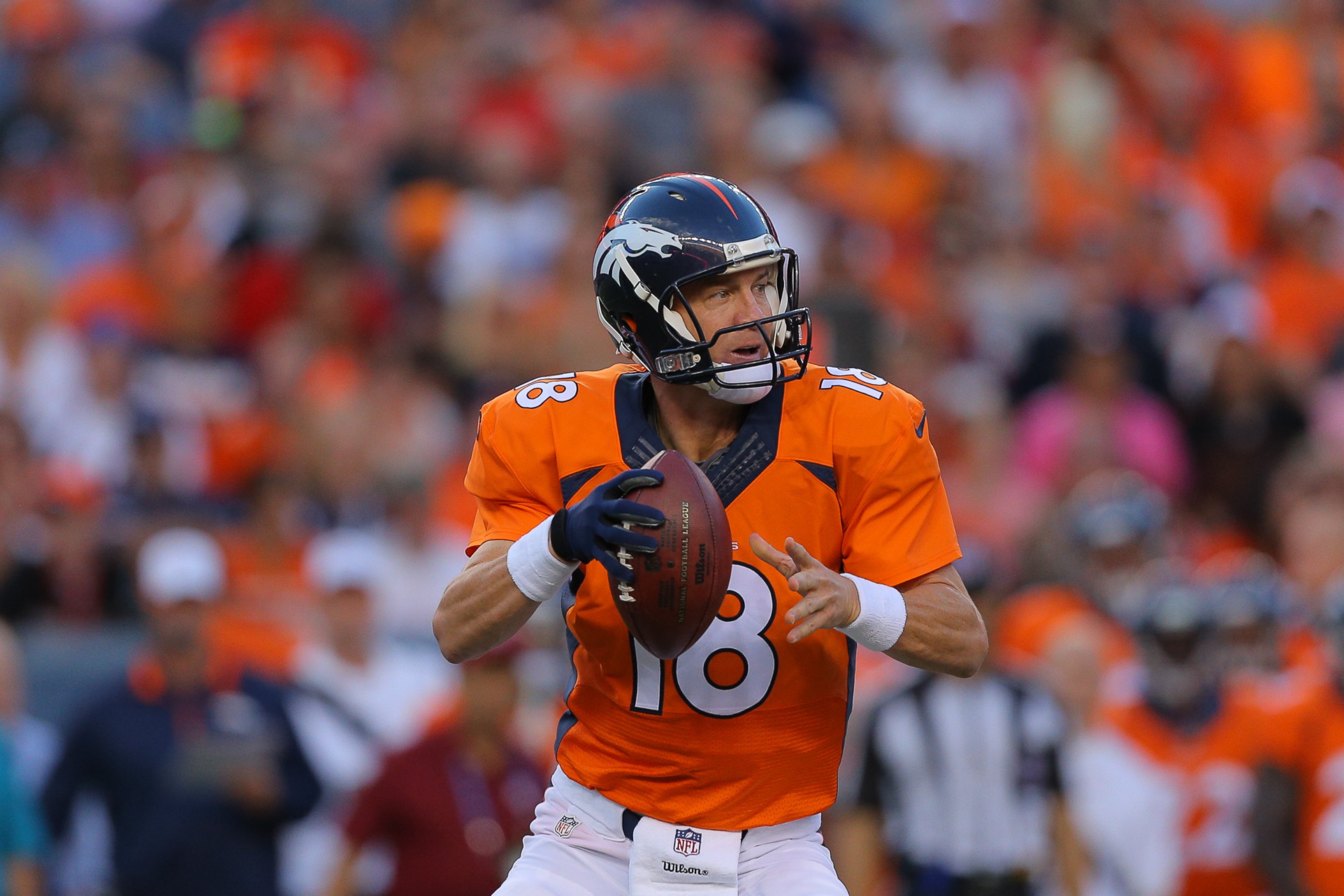 PHOTO: Peyton Manning of the Denver Broncos during a preseason game at Sports Authority Field at Mile High on Aug. 23, 2014 in Denver, Colorado.