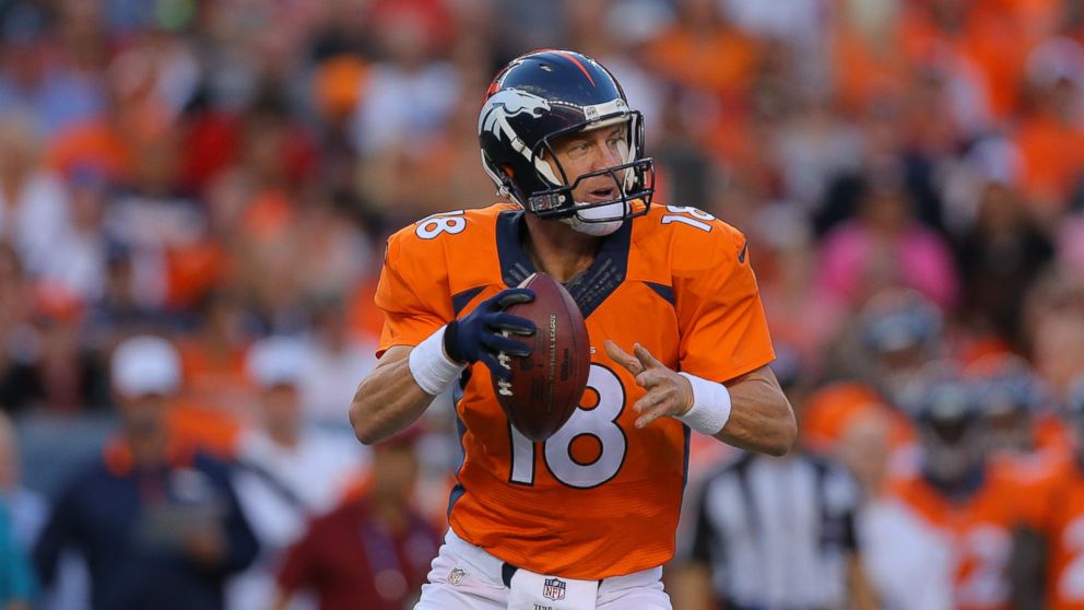 Quarterback Peyton Manning of the Denver Broncos in action against the Houston Texans during a preseason game at Sports Authority Field at Mile High on Aug. 23, 2014 in Denver, Colorado.