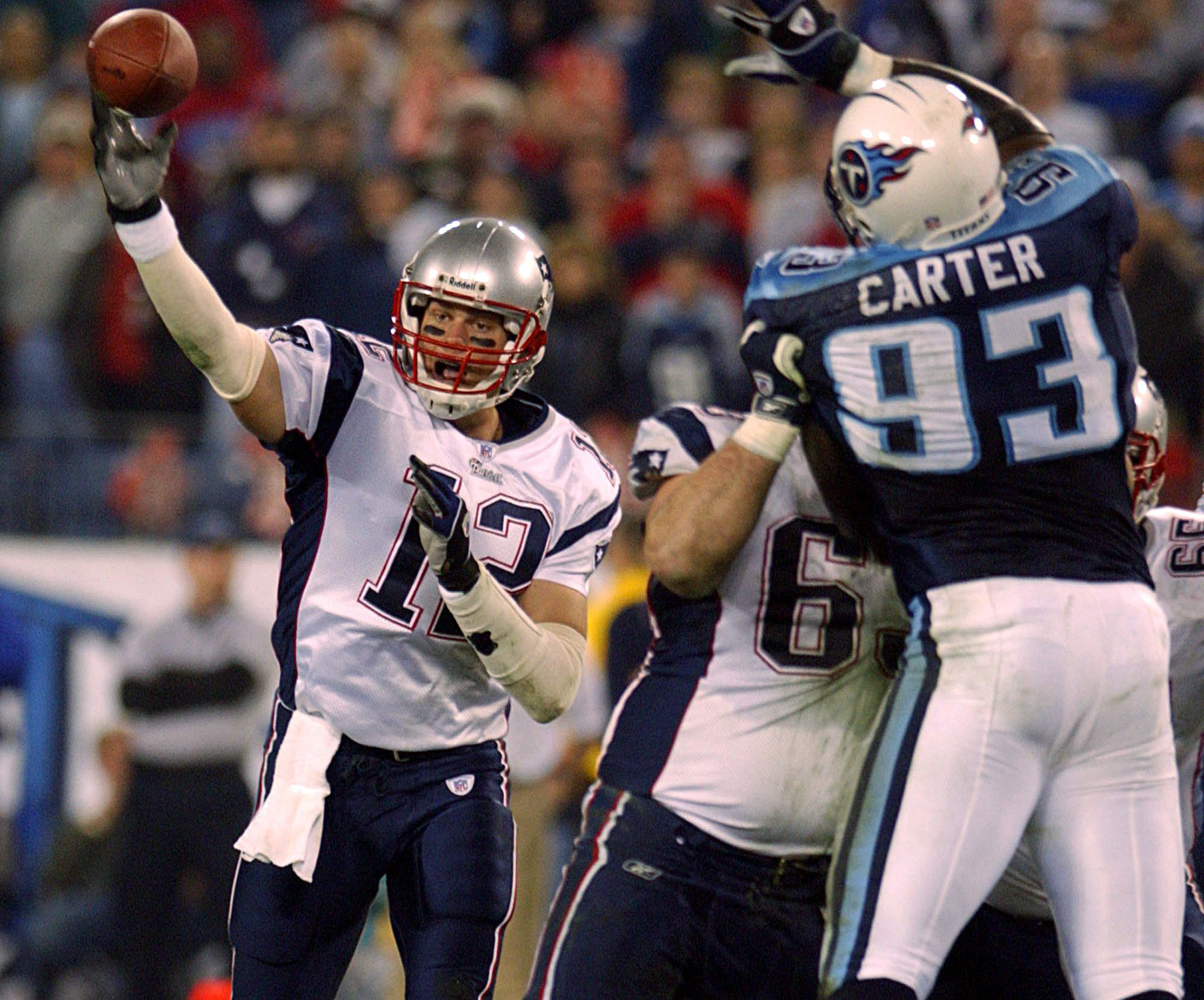 PHOTO: New England Patriots quarterback Tom Brady (L) throws a pass against the Tennessee Titans, Dec. 16m 2002 in Nashville, Tenn.  