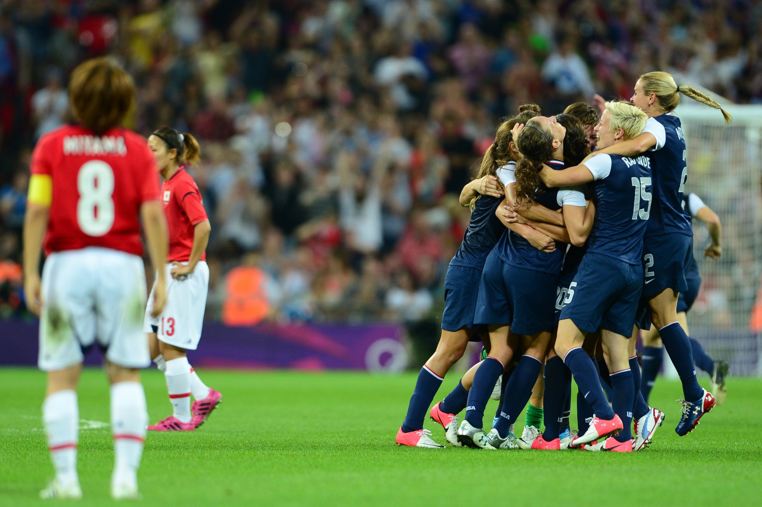 PHOTO: U.S. players celebrate winning gold against Japan during the final of the women's football competition of the London 2012 Olympic Games USA vs Japan, August 9, 2012, at Wembley stadium in London.