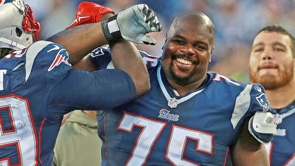 PHOTO: Vince Wilfork smiles as he leaves the game at the end of the fourth quarter after the New England Patriots played the Detroit Lions in Foxborough, Mass. on Nov. 23, 2014.