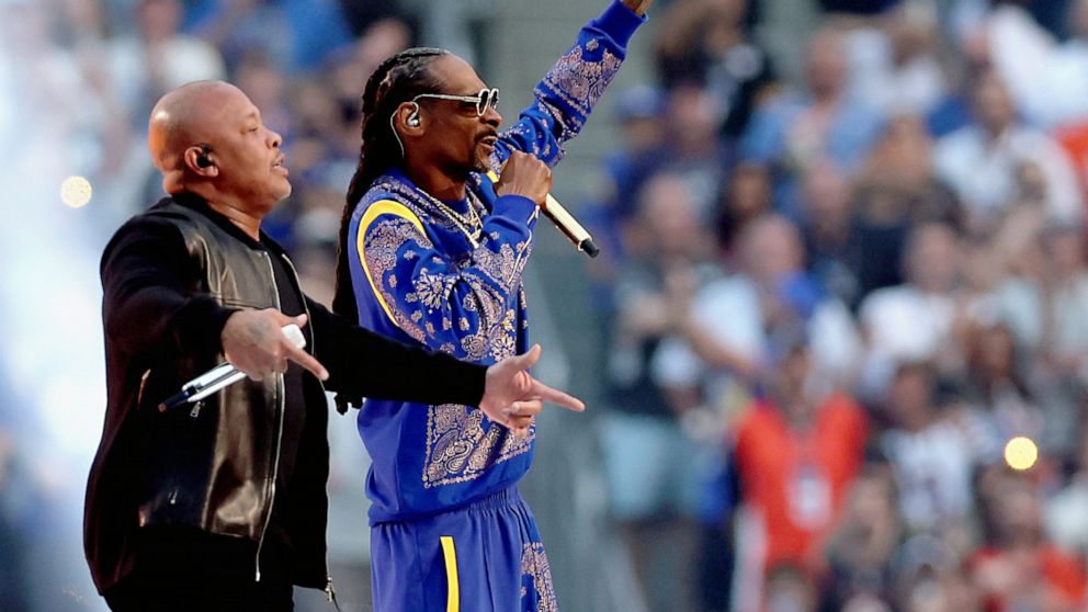 PHOTO: INGLEWOOD, CALIFORNIA - FEBRUARY 13: Dr. Dre and Snoop Dogg perform during the Pepsi Super Bowl LVI Halftime Show at SoFi Stadium on February 13, 2022 in Inglewood, California. (Photo by Rob Carr/Getty Images)