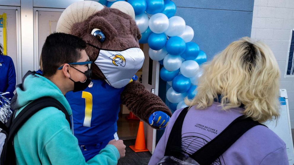 PHOTO: Students are greeted by Rampage the LA Rams mascot at Olive Vista Middle School in Sylmar, Calif., Jan. 11, 2021. 