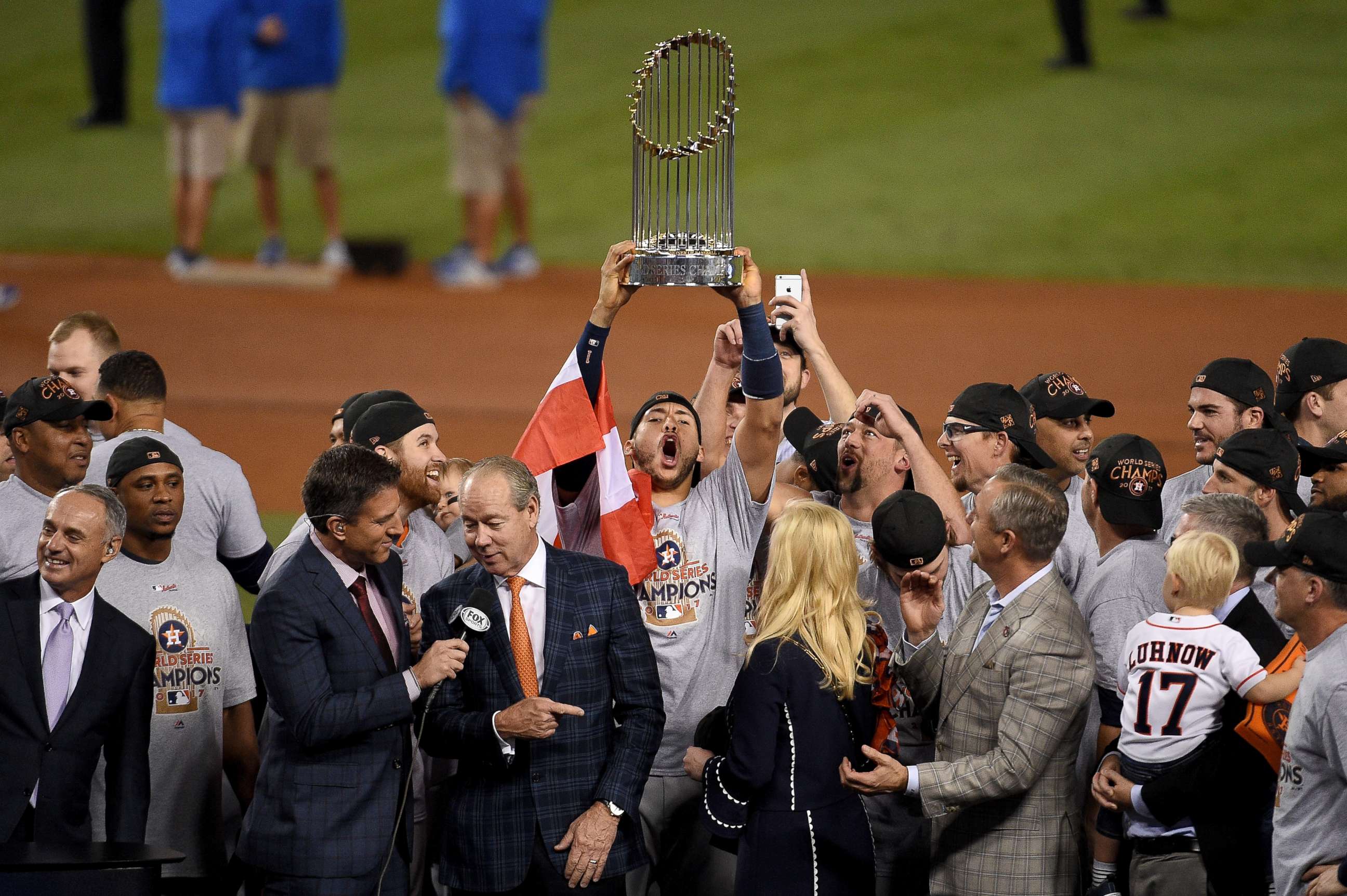 PHOTO: Carlos Correa, #1 of the Houston Astros, hoists the Commissioner's Trophy after defeating the Los Angeles Dodgers 5-1 in game seven to win the 2017 World Series at Dodger Stadium on Nov. 1, 2017, in Los Angeles.