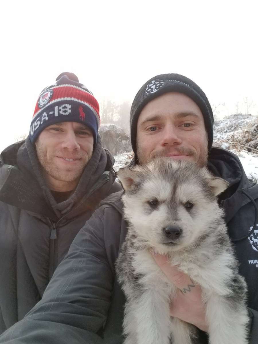PHOTO: US Olympian Gus Kenworthy, with his boyfriend Matt Wilkas, holds a dog that the couple is rescuing from a South Korean dog meat farm. Kenworthy posted the photo on Instagram on Feb. 23, 2018.