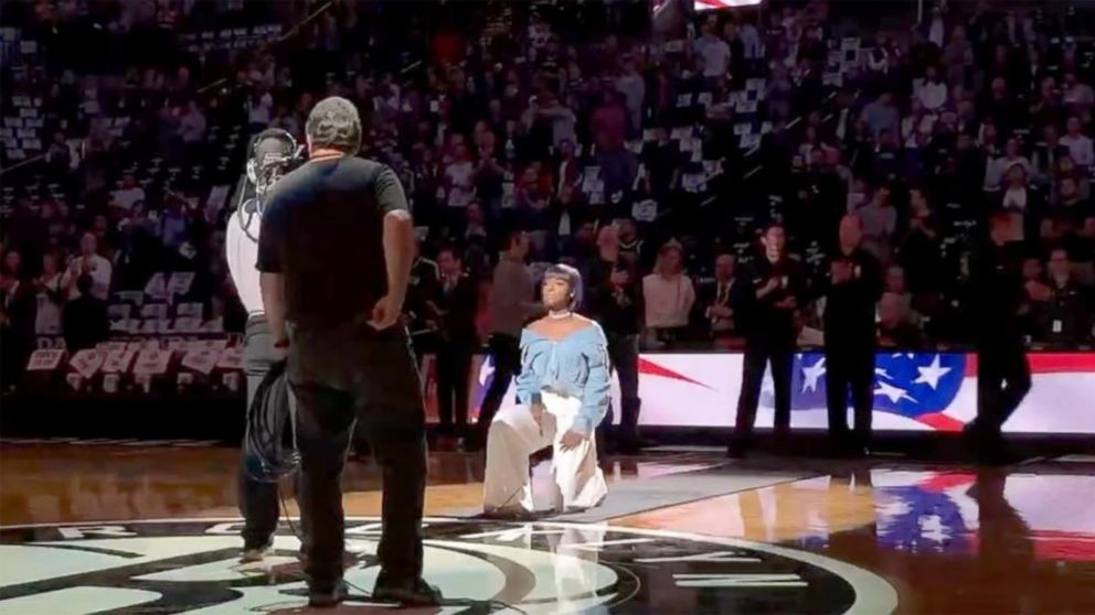 PHOTO: A screengrab from a video that singer Justine Skye posted to her Instagram account of herself taking a knee during her performance of the national anthem during a Brooklyn Nets game in Brooklyn, N.Y. on Oct. 20, 2017.