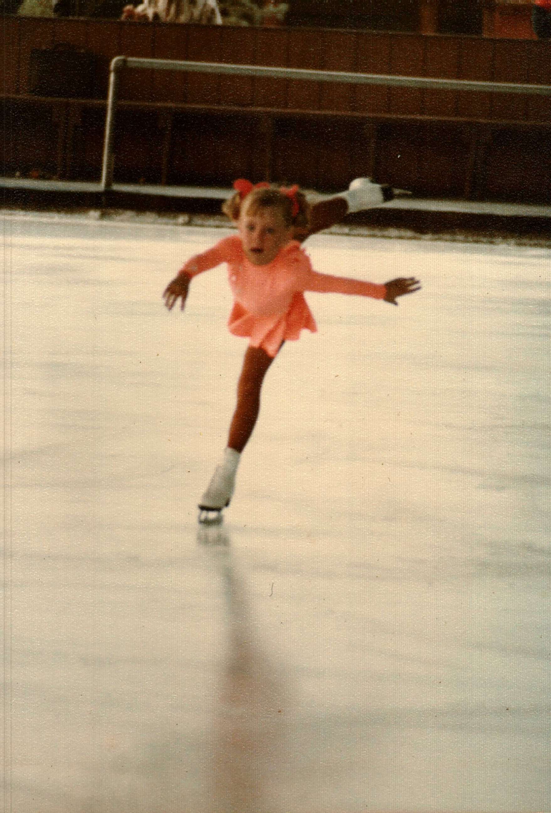 Tonya Harding is seen here skating a young girl in this undated family photo. 