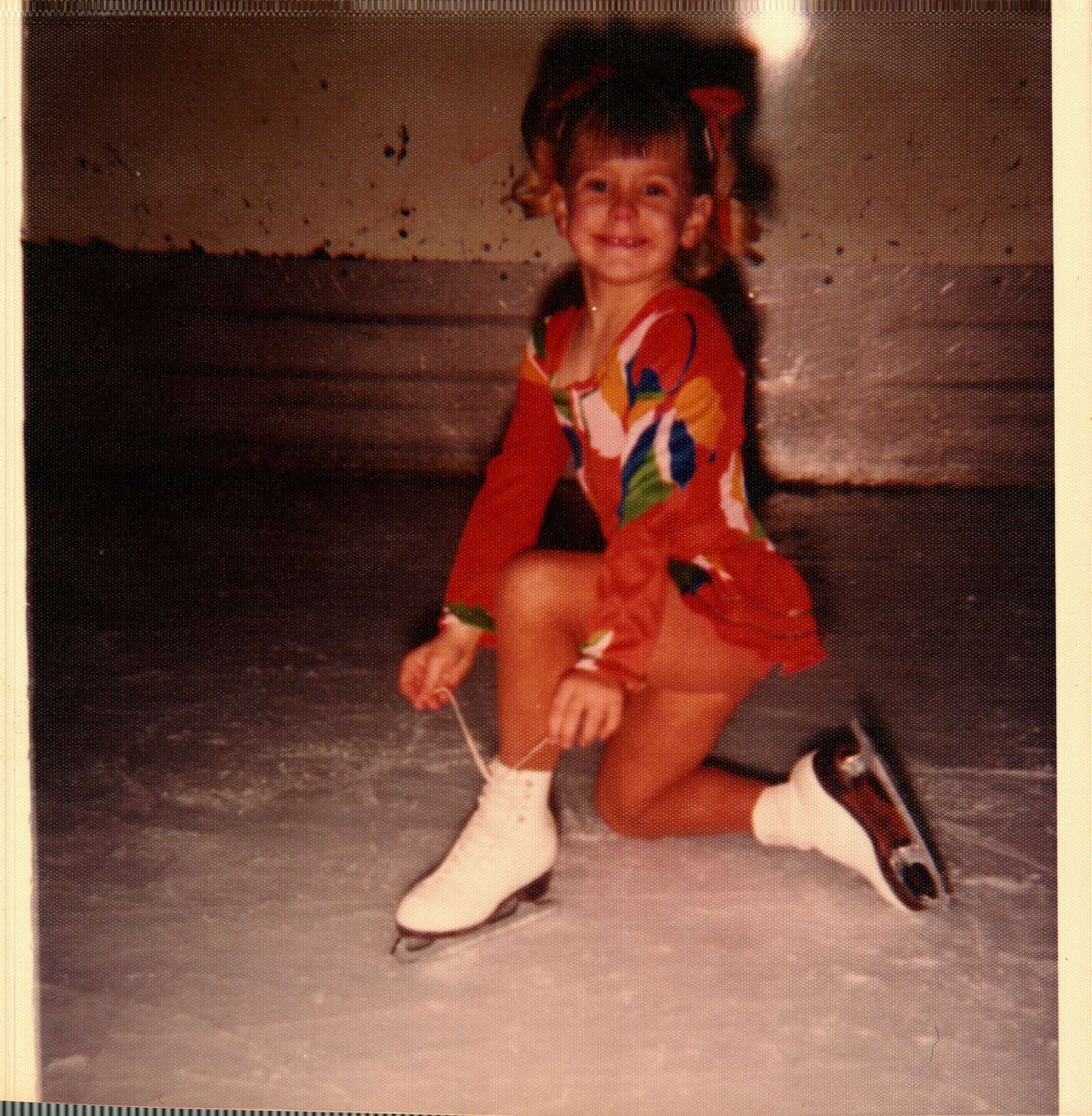 Tonya Harding is seen here tying the laces on her ice skates in this undated family photo.