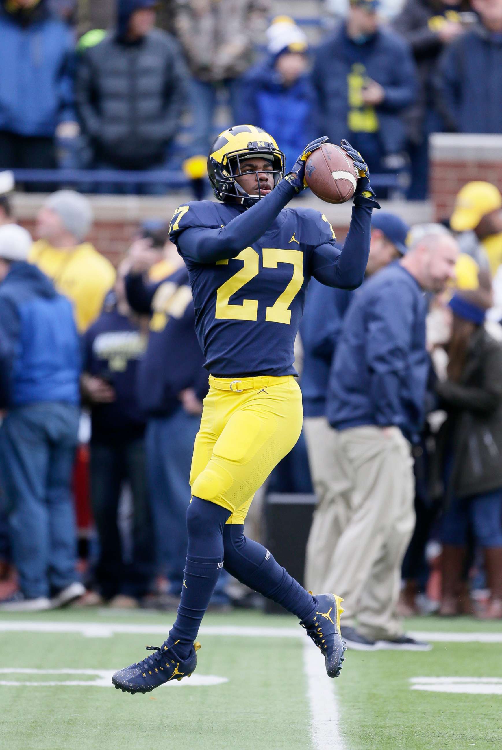 PHOTO: Defensive back Hunter Reynolds of the Michigan Wolverines makes a catch before their game against the Rutgers Scarlet Knights at Michigan Stadium, Oct. 28, 2017 in Ann Arbor, Mich.