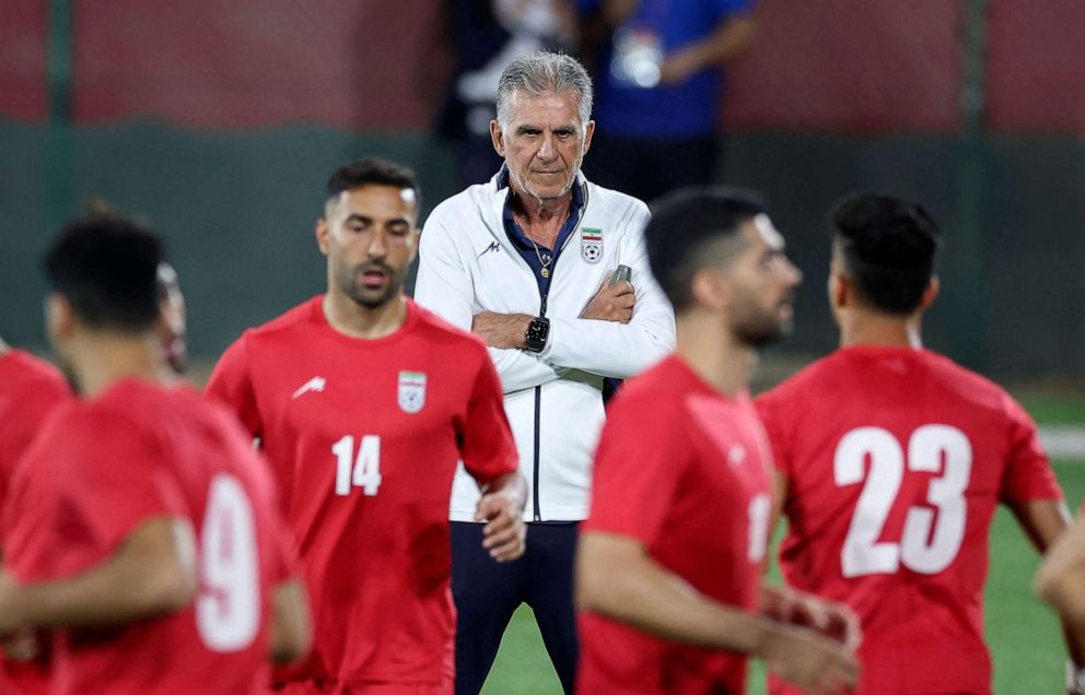 PHOTO: Iran's Portuguese coach Carlos Queiroz heads a training session at Al Rayyan SC in the Al Rayyan district in Doha on Nov. 28, 2022, on the eve of the Qatar 2022 World Cup football match between Iran and USA.