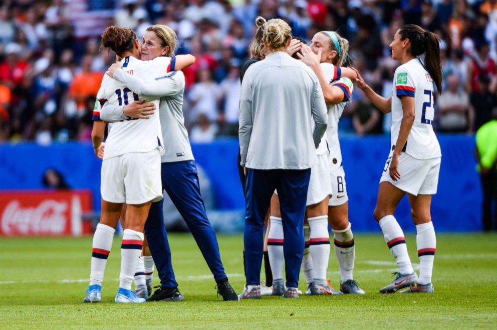 PHOTO: Unites States players celebrate their victory with United State's head coach Jillian Ellis during the 2019 FIFA Women's World Cup France Final match between United States and Netherlands at Groupama Stadium on July 7, 2019 in Lyon, France.