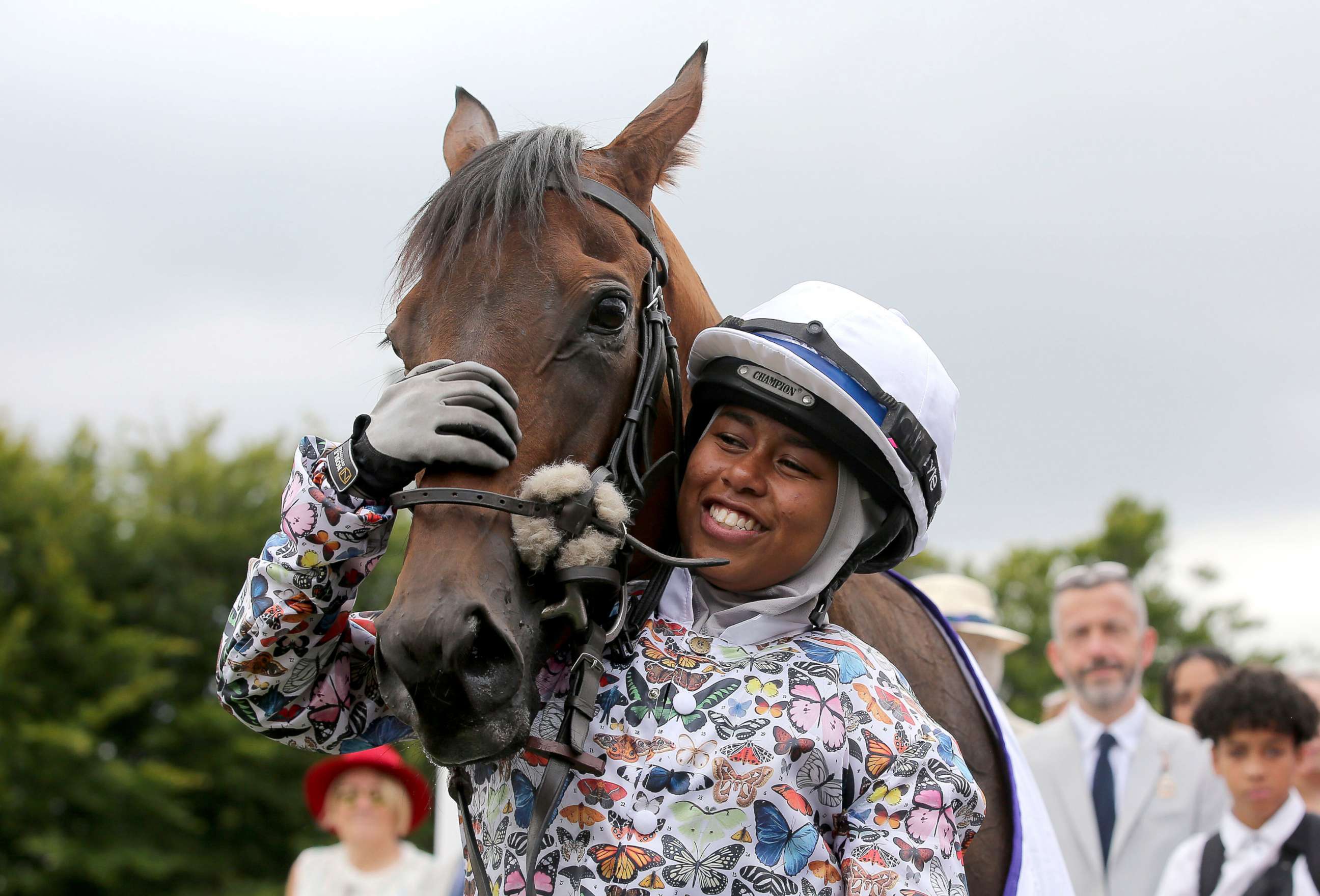 PHOTO: British Jockey Khadijah Mellah cuddles Haverland after winning the all-female Magnolia Cup, an amateur jockey's charity race, on Thursday, Aug. 1, 2019.