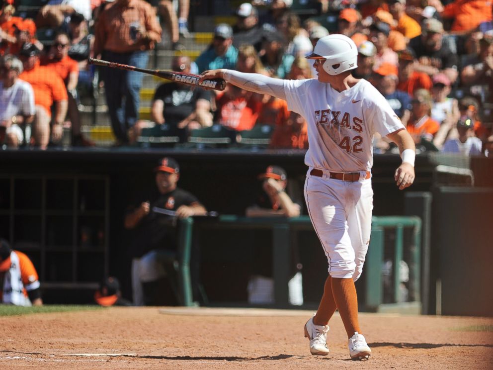 PHOTO: In this May 28, 2017, photo, Texas' Kacy Clemens celebrates after scoring a run in the championship game in the Big 12 baseball tournament in Oklahoma City. 