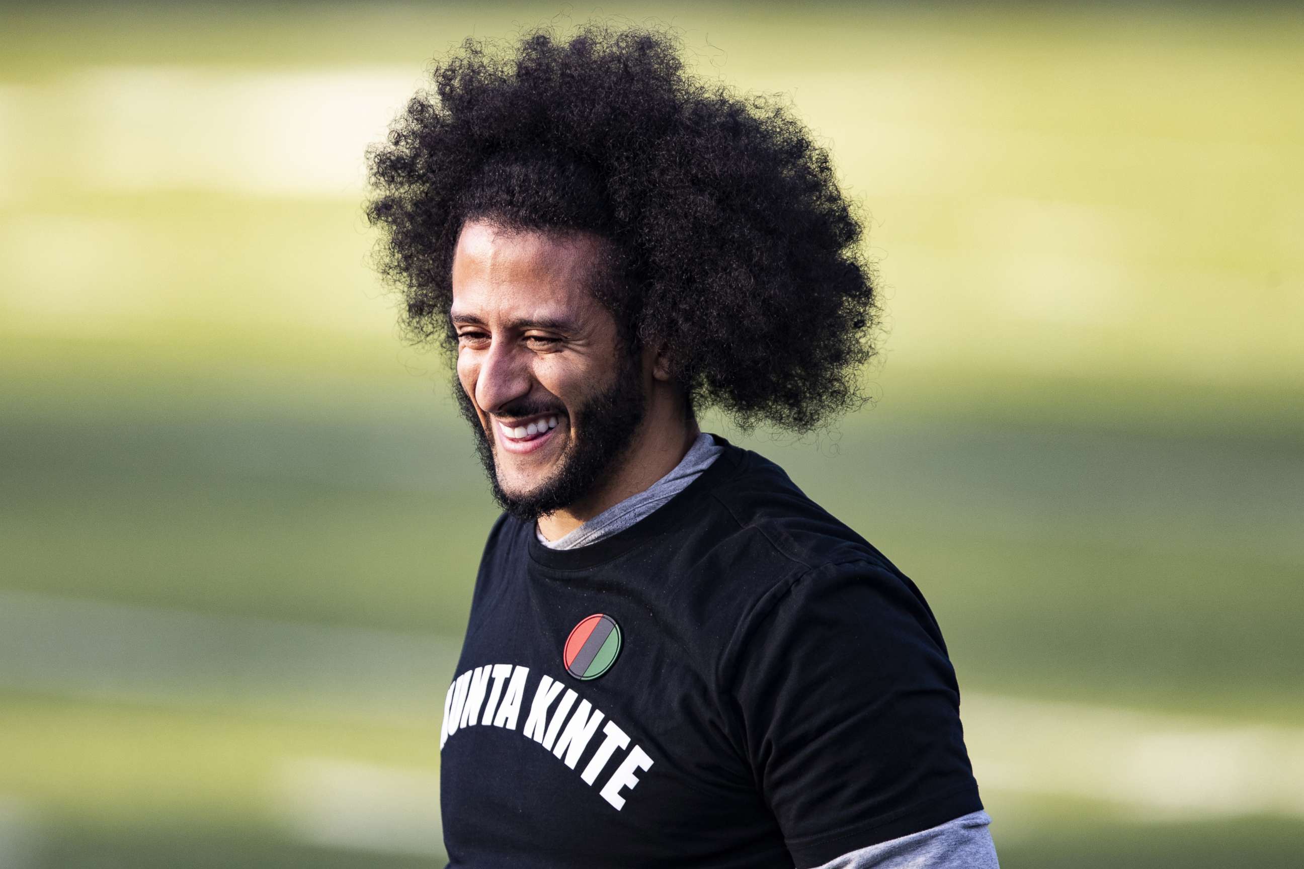 PHOTO: Colin Kaepernick looks on during a private NFL workout held at Charles R. Drew high school Nov. 16, 2019 in Riverdale, Georgia.