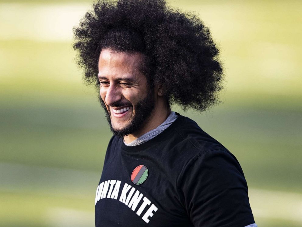 PHOTO: Colin Kaepernick looks on during a private NFL workout held at Charles R. Drew high school Nov. 16, 2019 in Riverdale, Georgia.