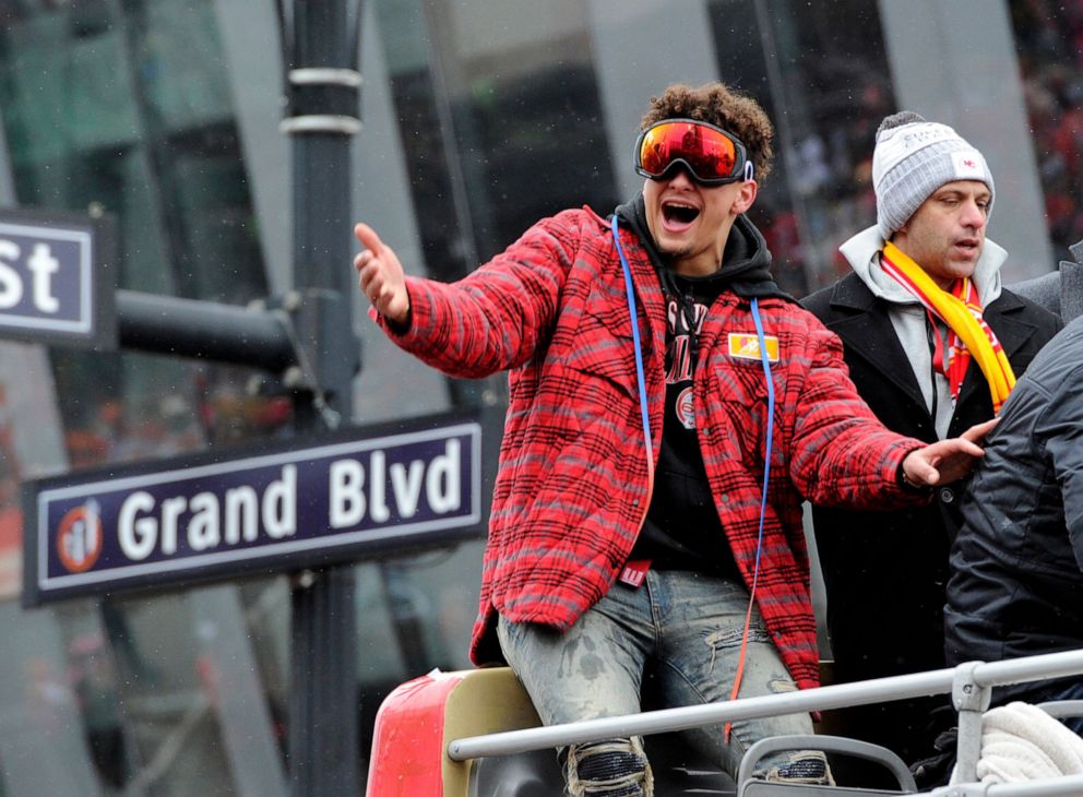 PHOTO: Kansas City Chiefs Quarterback and Super Bowl MVP Patrick Mahomes gestures to the crowd as he rides by in Kansas City, Mo., Feb. 5, 2020.