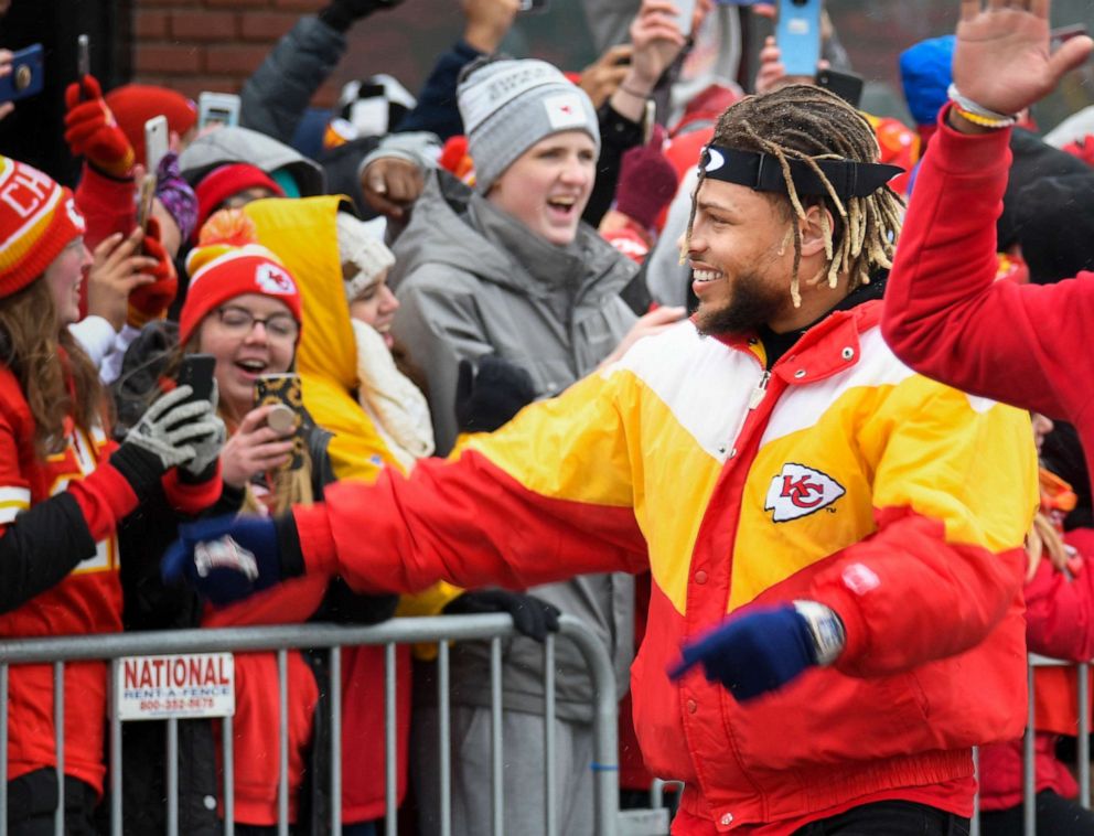 PHOTO: Kansas City Chiefs strong safety Tyrann Mathieu walks near the crowd during a parade through downtown Kansas City, Mo., Feb. 5, 2020, to celebrate the Chiefs victory in the NFL's Super Bowl 54.