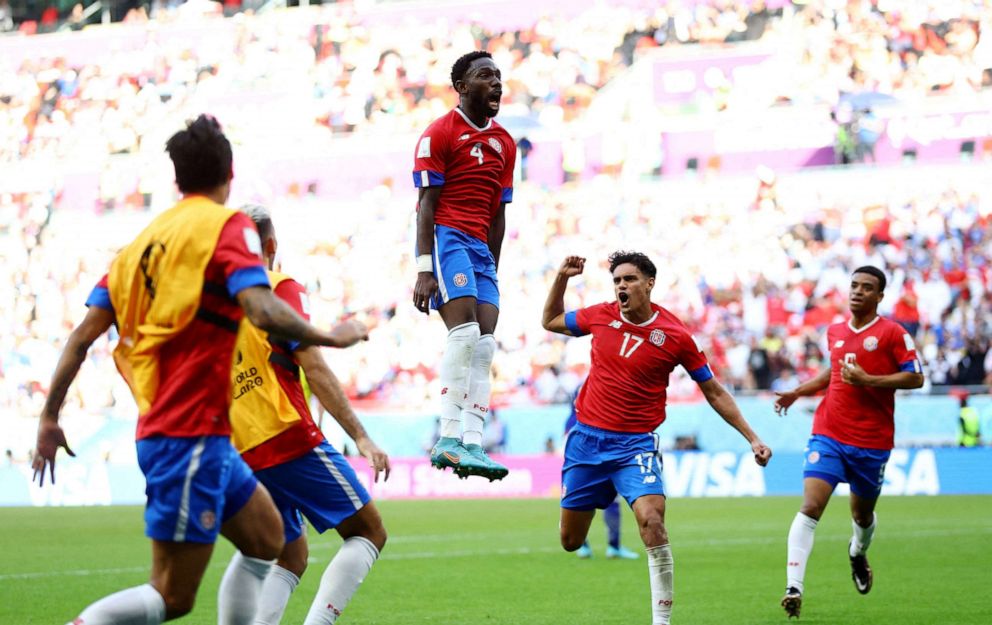 PHOTO: Costa Rica's Keysher Fuller celebrates scoring their first goal with Yeltsin Tejeda and teammates, on Nov. 27, 2022.
