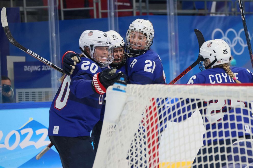 Savannah Harmon (15) of Team USA celebrates her third period goal against the Czech Republic with Kendall Coyne Schofield,Hannah Brandt,and Hilary Knight in the Women's Ice Hockey Quarterfinal match at the Winter Olympics on Feb. 11, 2022,in Beijing.