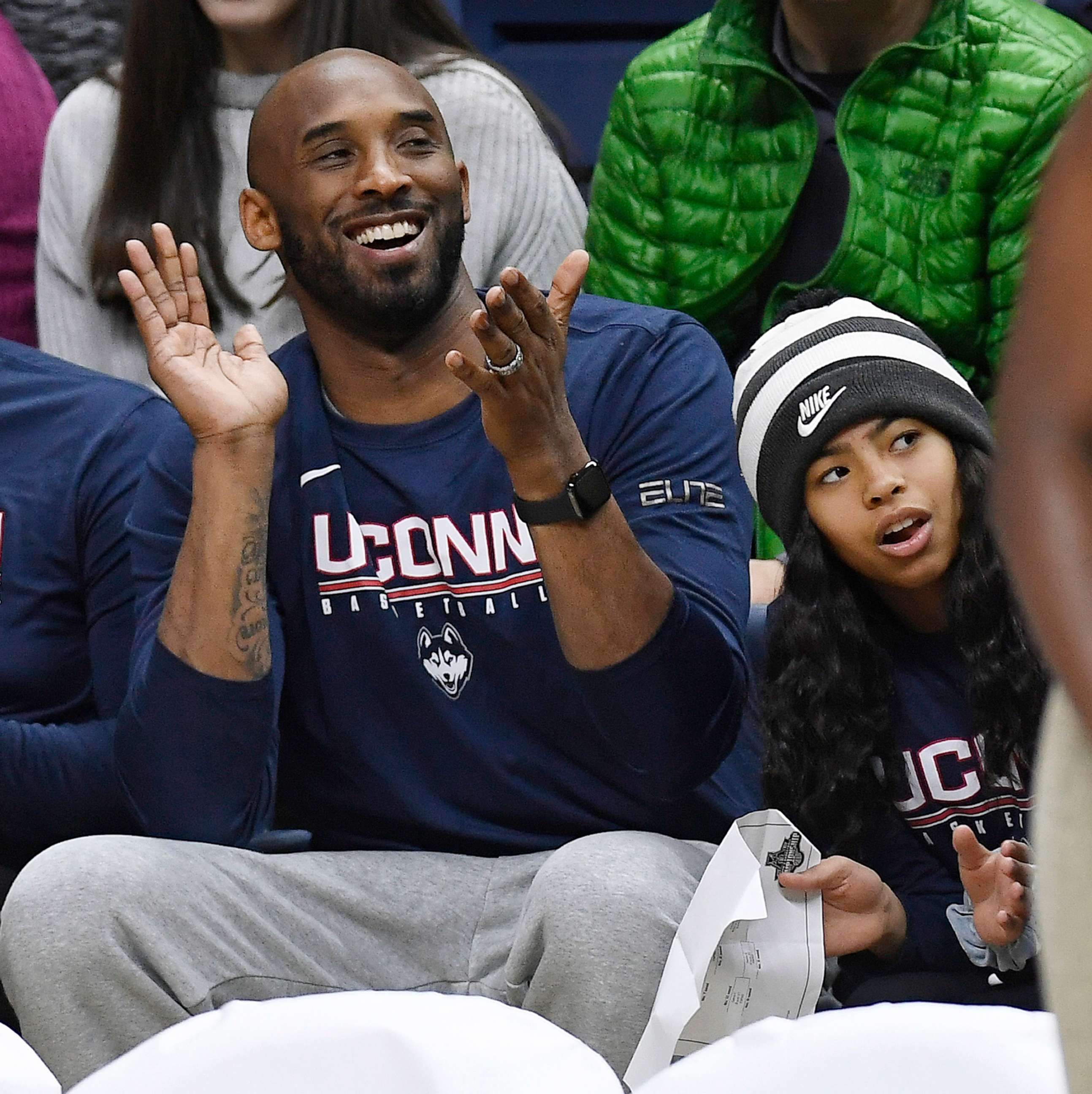 PHOTO:In this March 2, 2019 photo, Kobe Bryant and his daughter Gianna watch a NCAA college basketball game between Connecticut and Houston in Storrs, Conn.