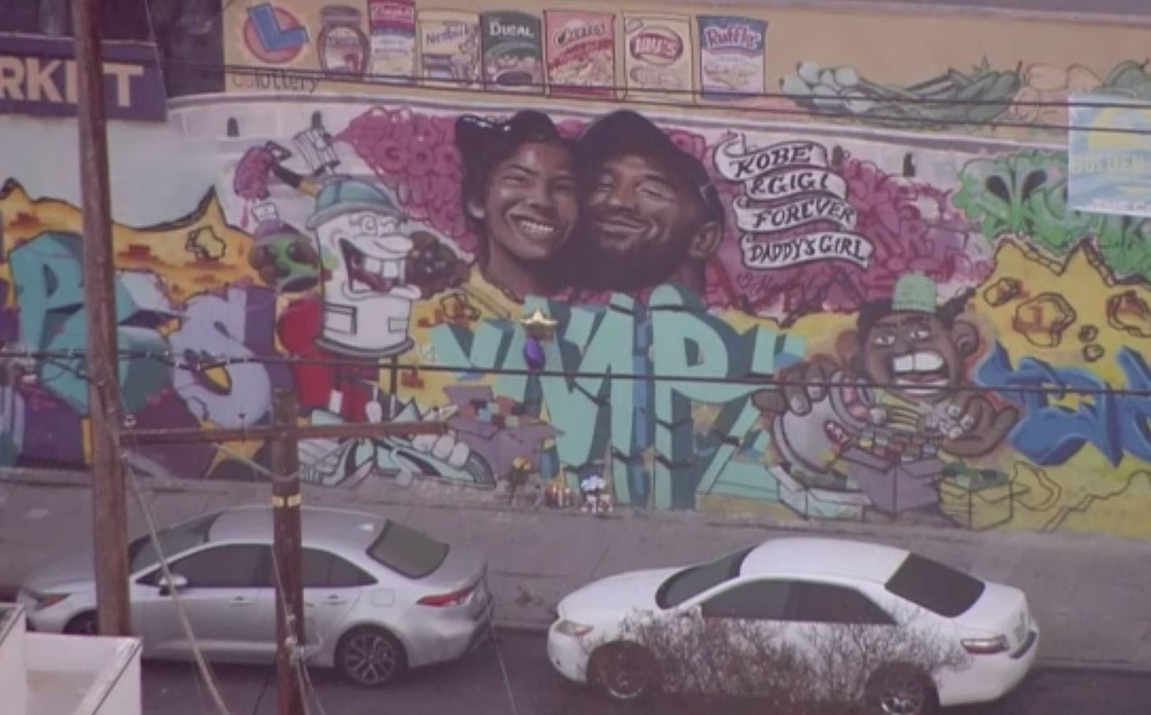 PHOTO: A mural of Kobe and Gianna Bryant emerged in Mid-Ciy, Los Angeles less than 24-hours after the two died in a helicopter crash.