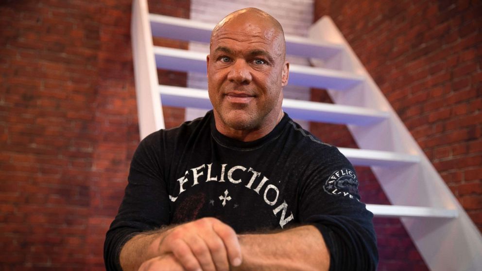 U.S. wrestler and actor Kurt Angle poses on November 4, 2017, as he attends the 2017 Paris Games Week, at the Porte de Versailles exhibition centre in Paris.