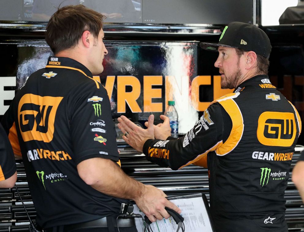 PHOTO: In this Oct 4, 2019, file photo, NASCAR Cup Series driver Kurt Busch (right) talks to his crew chief Matt McCall (left) during practice for the Drydene 400 at Dover International Speedway in Dover, DE.