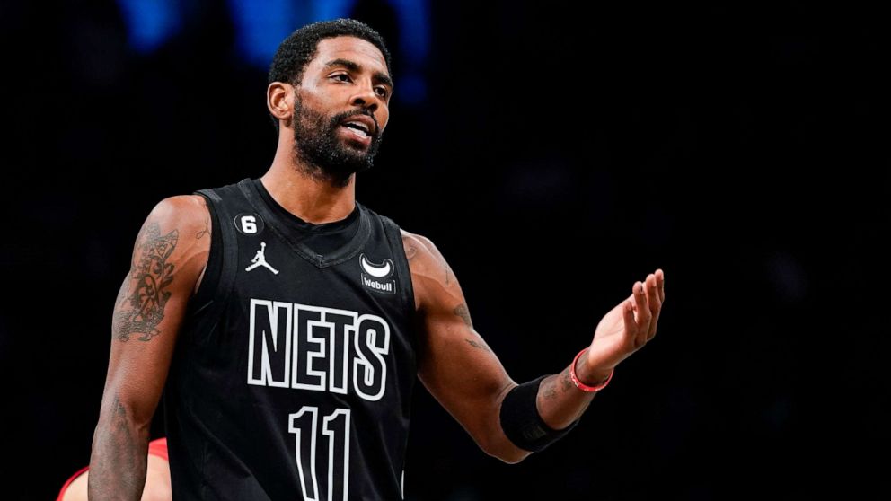 PHOTO: Brooklyn Nets guard Kyrie Irving gestures during the first half of the team's NBA basketball game against the Toronto Raptors on Friday, Dec. 2, 2022, in New York.