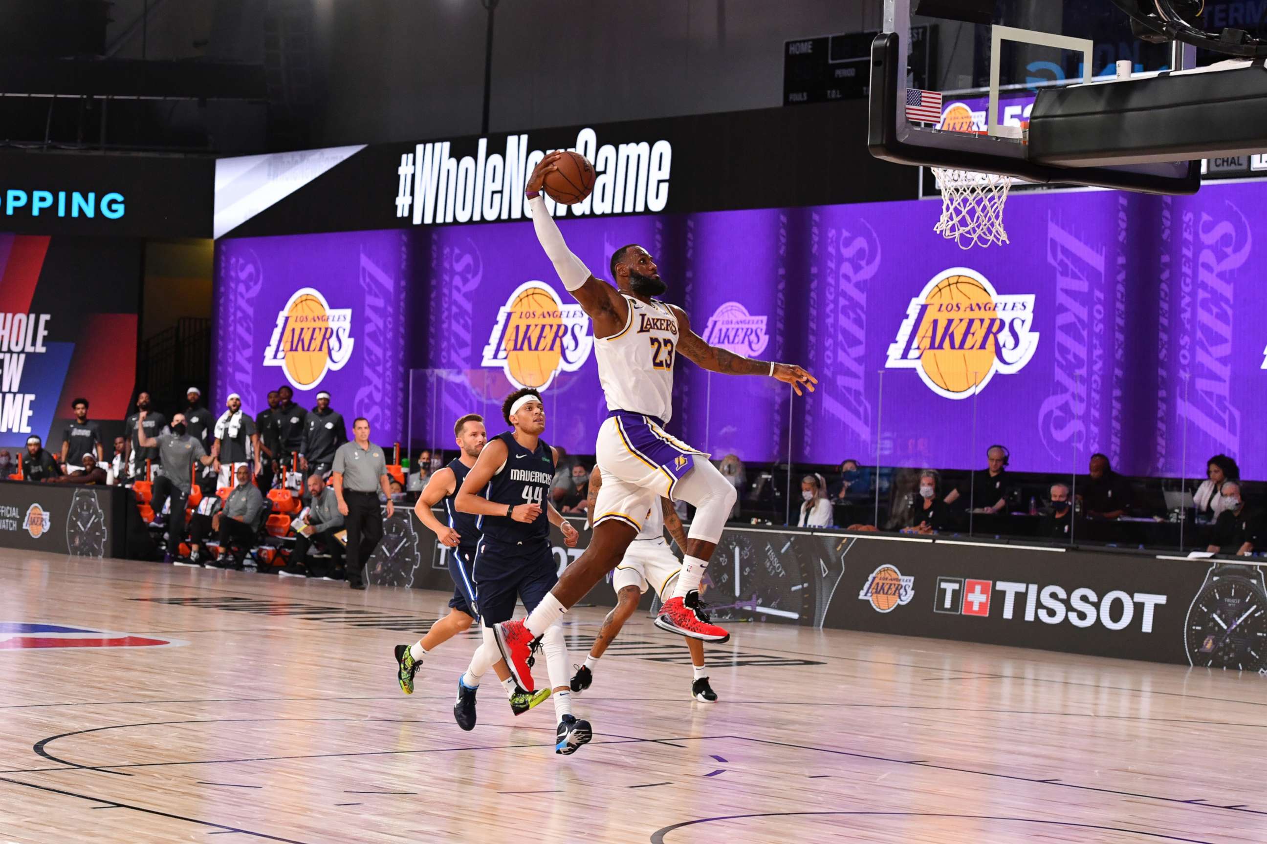 PHOTO: LeBron James of the Los Angeles Lakers dunks the ball against the Dallas Mavericks on July 23, 2020, at the Visa Athletic Center at ESPN Wide World of Sports Complex in Orlando, Fla.