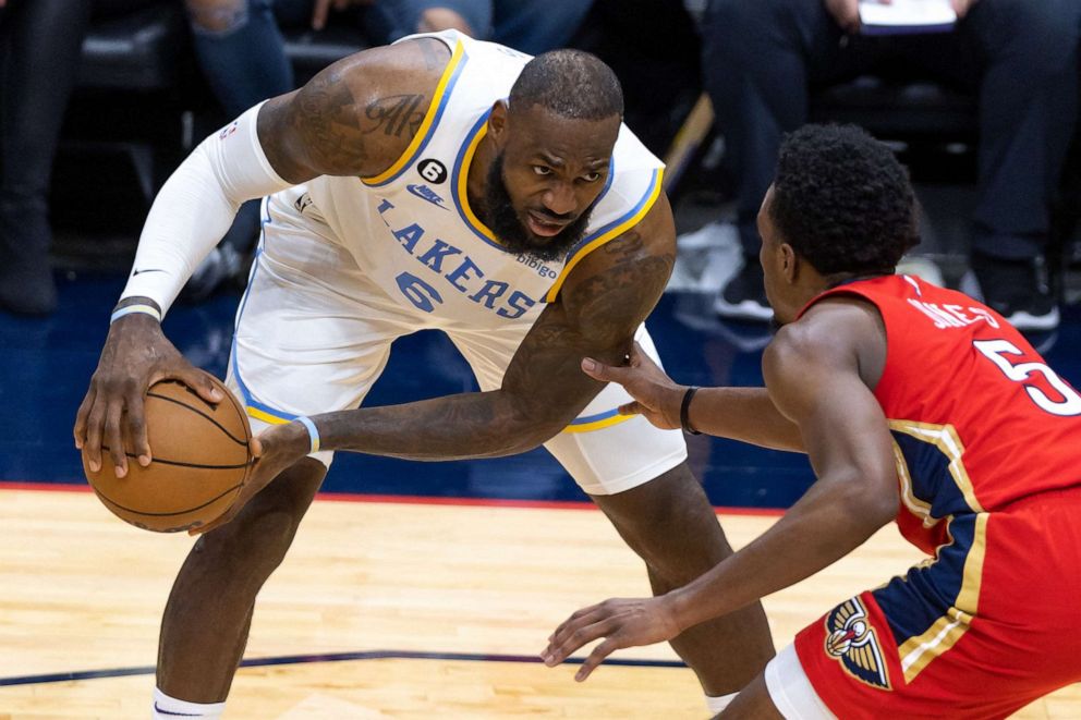 PHOTO: Los Angeles Lakers forward LeBron James stares down New Orleans Pelicans forward Herbert Jones during the second half at Smoothie King Center in New Orleans, Feb. 4, 2023.