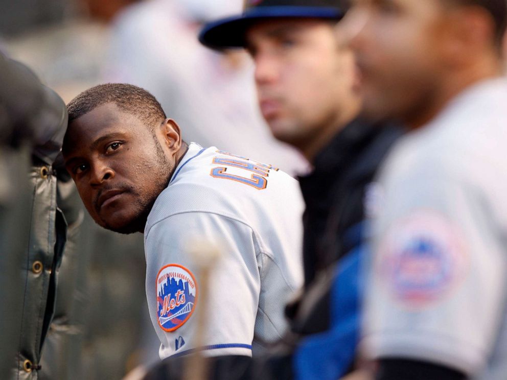 PHOTO: In this June 21, 2008 file photo, New York Mets second baseman Luis Castillo rests his head against the dugout rail in the eighth inning of the Colorado Rockies 7-1 victory over the Mets in a Major League baseball game in Denver.