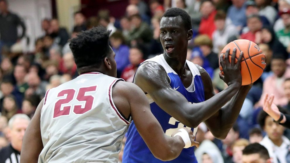 PHOTO: In this Jan. 19, 2020, file photo, Hillcrest Prep's Makur Maker controls the ball against Sunrise Christian Academy during a high school basketball game at the Hoophall Classic in Springfield, Mass.