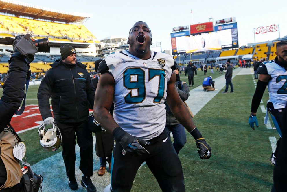 PHOTO: Jacksonville Jaguars defensive tackle Malik Jackson (97) celebrates as he leaves the field after a 45-42 win over the Pittsburgh Steelers in an NFL divisional football AFC playoff game in Pittsburgh, Sunday, Jan. 14, 2018.