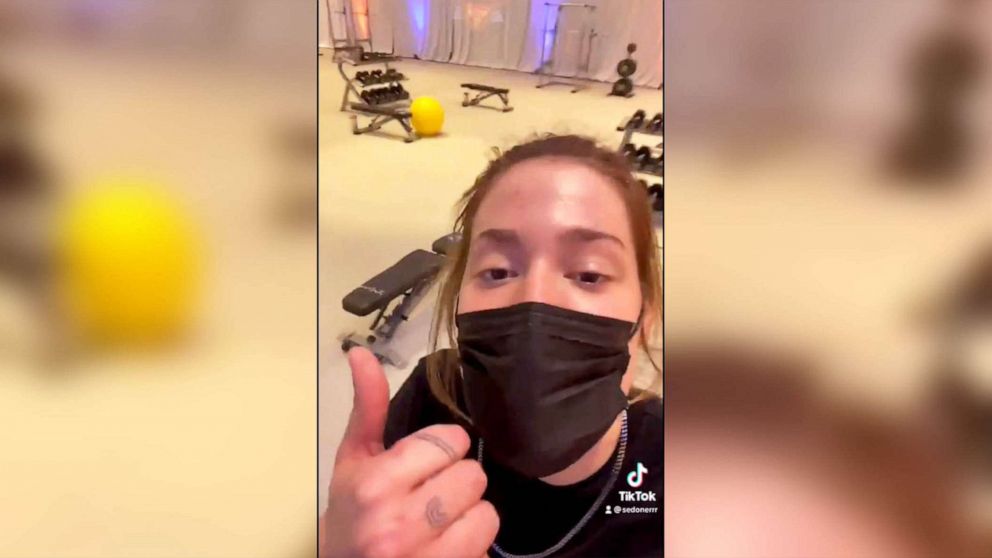 PHOTO: A Tik Tok video posted by Sedona Prince shows Price standing in the upgraded women's weight room at March Madness in San Antonio after improvements were made in response to her prior social media post.