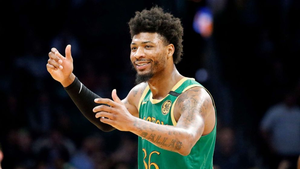 PHOTO: In this March 3, 2020, file photo, Boston Celtics guard Marcus Smart (36) reacts to a call during the second half of an NBA basketball game against the Brooklyn Nets in Boston. 